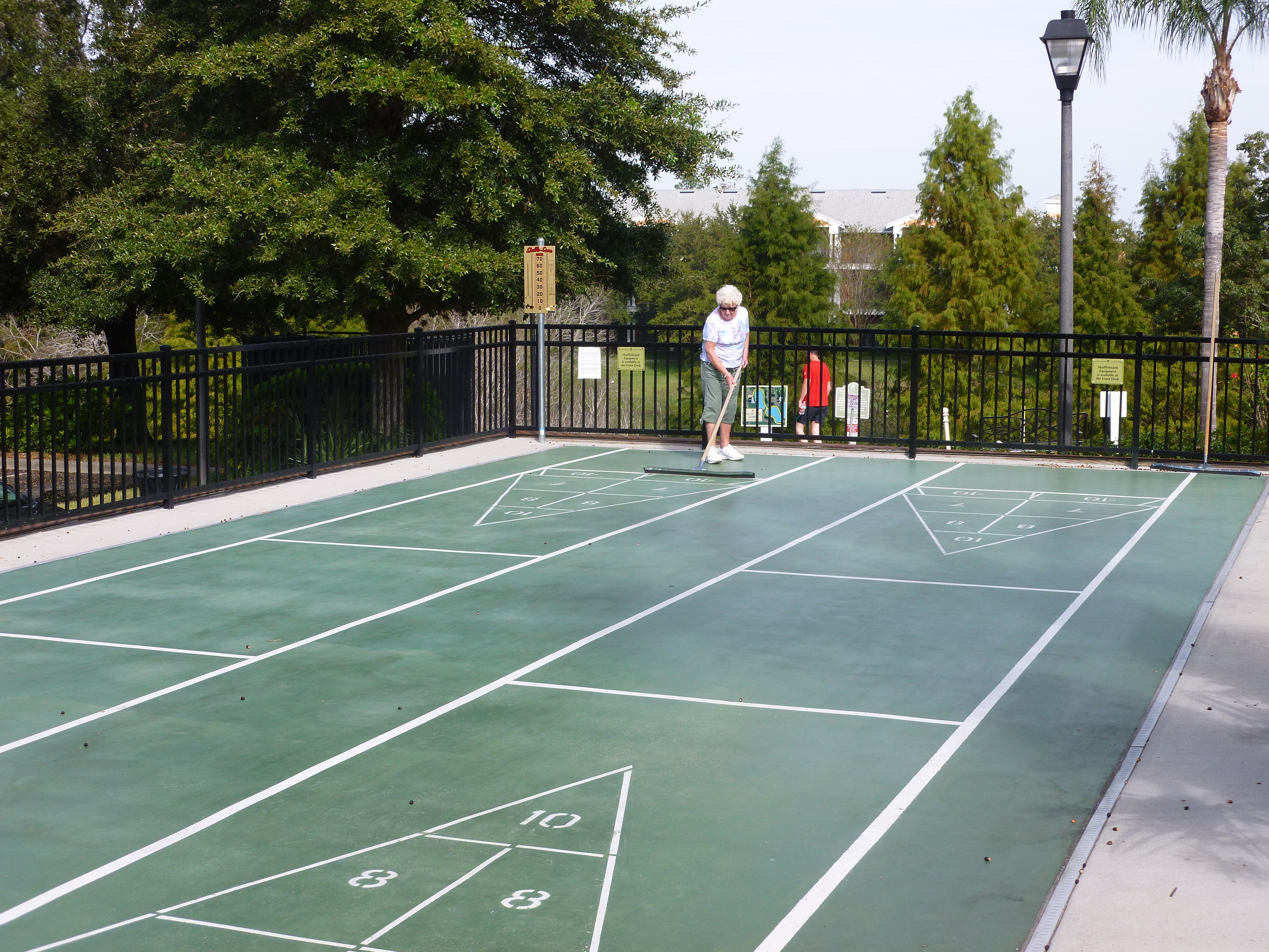 Playing shuffleboard at Bahama Bay Resort and Spa Orlando Florida