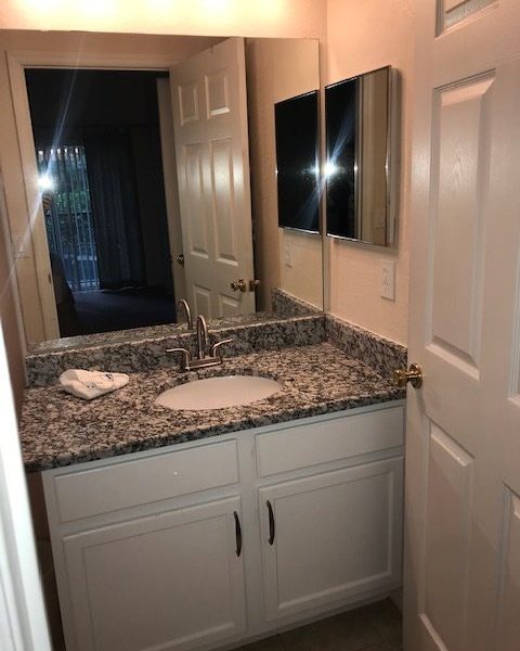 Master bathroom with new granite counter, undermount sink, new faucet, new cabinet